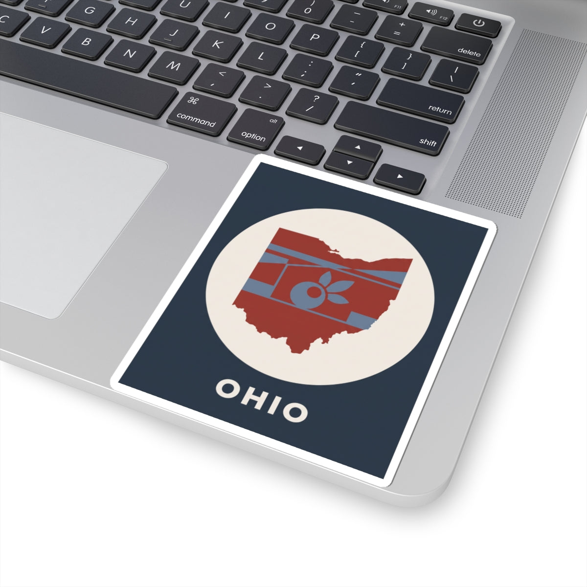 Ohio sticker on laptop, square border design with state map and apple icon plus OHIO