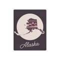 Mauve metal wall art with circular Alaska silhouette and cursive “Alaska” lettering