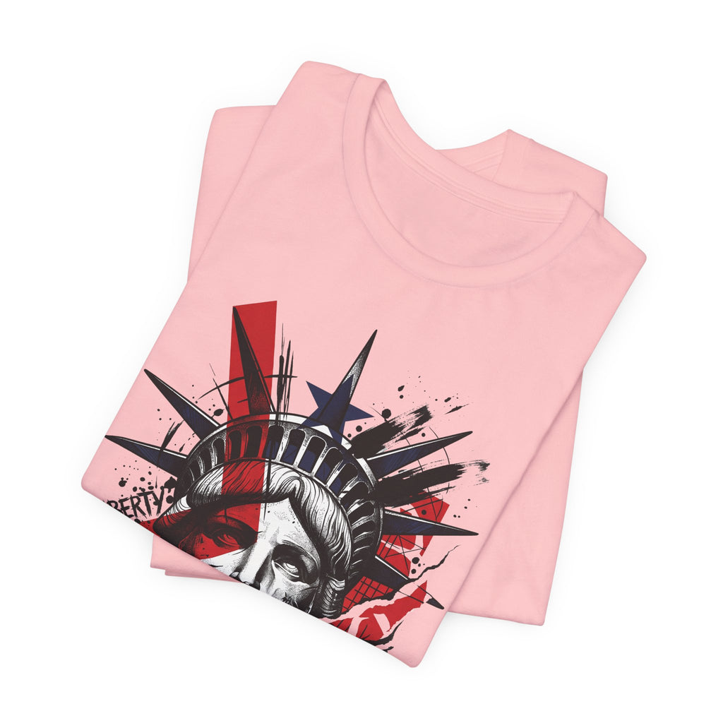 Light pink graphic T-shirt with Liberty statue head portrait, red and black splash