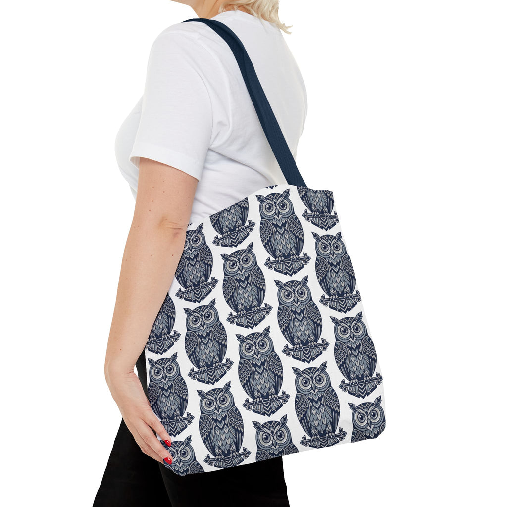 Owl-pattern tote bag on shoulder with navy strap, blue and white owl repeat design