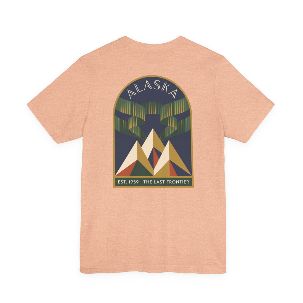 Tan graphic T-shirt with Alaska aurora badge and mountain design