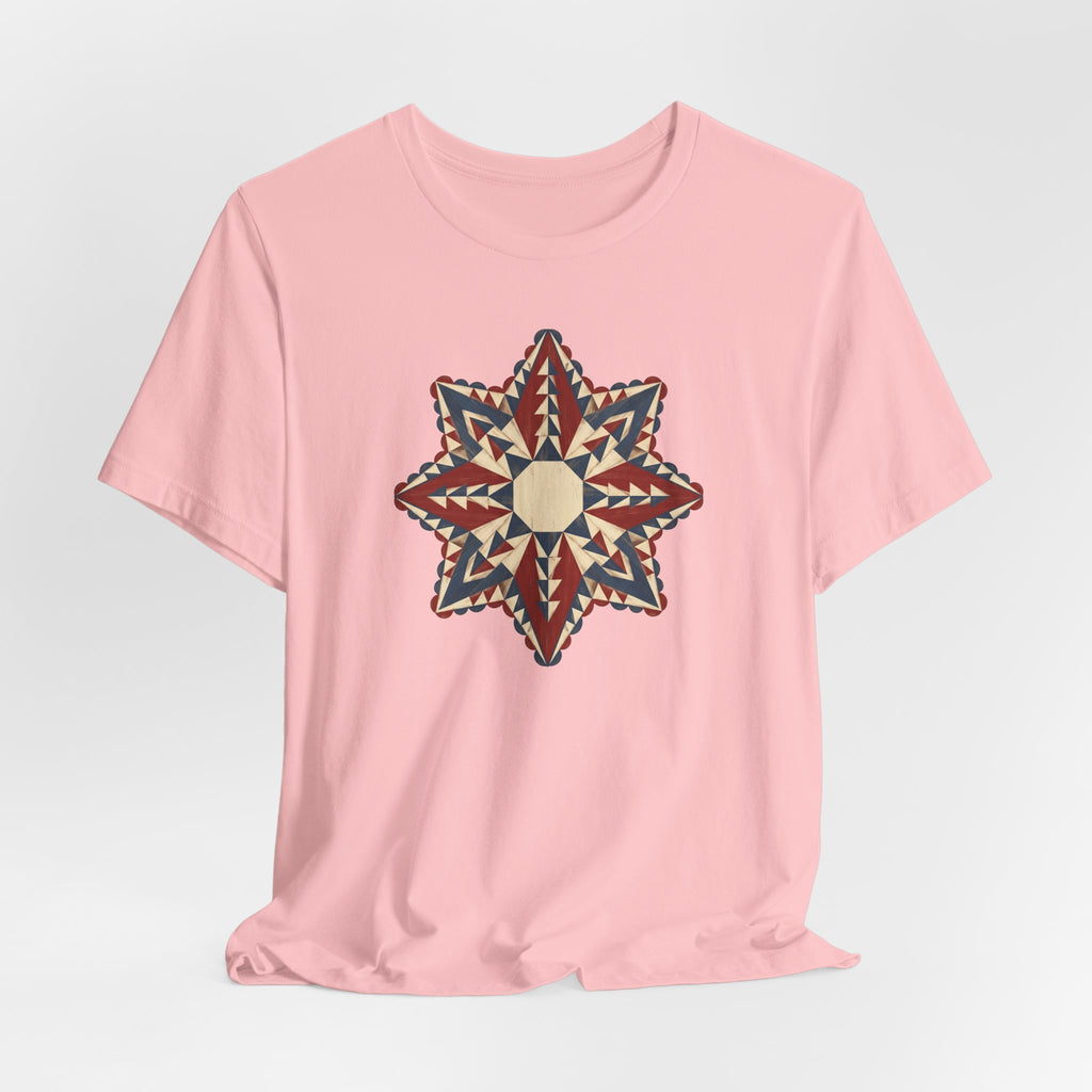 Pink graphic tee with geometric star mandala print at center chest