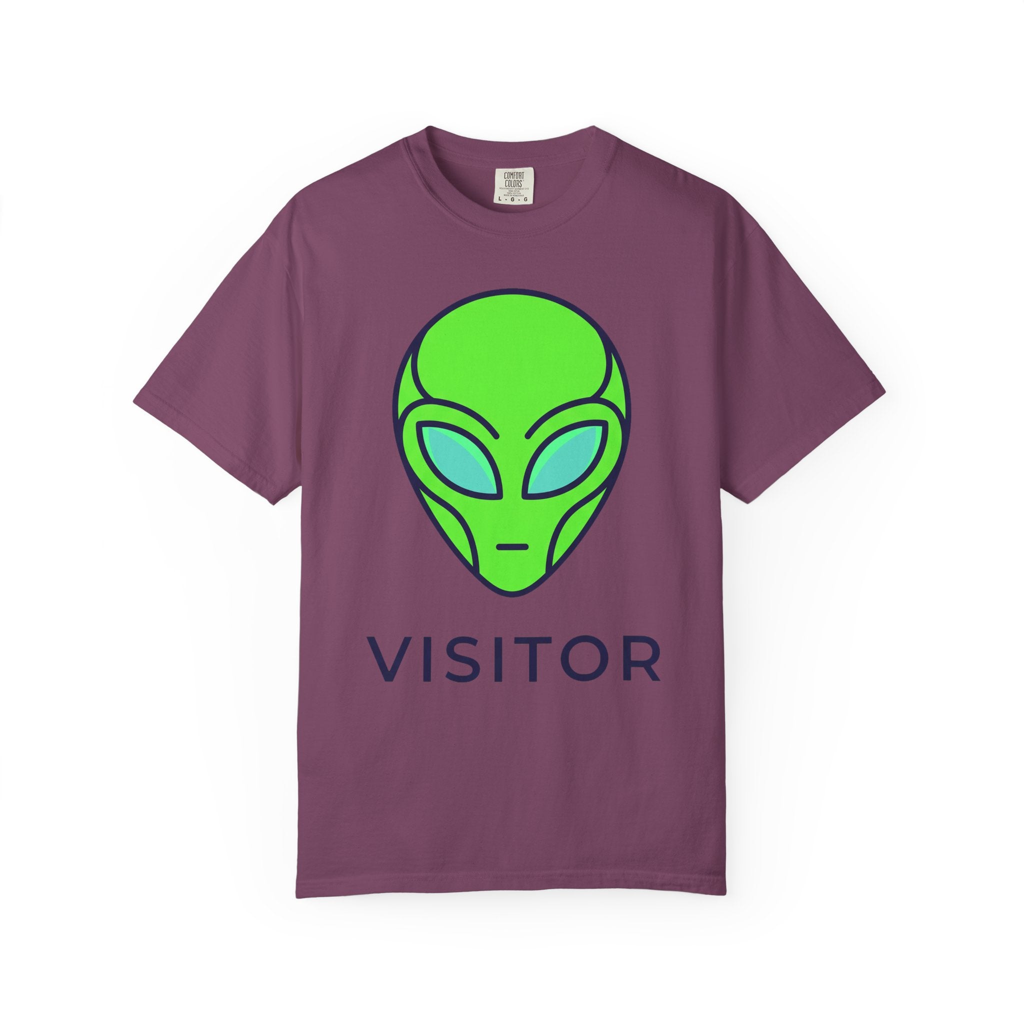 Alien visitor T-shirt in plum with neon green alien face and “VISITOR” text
