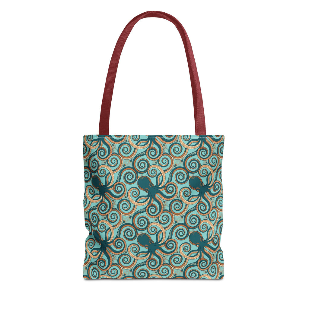 Teal tote bag with all-over octopus swirl pattern and red handles