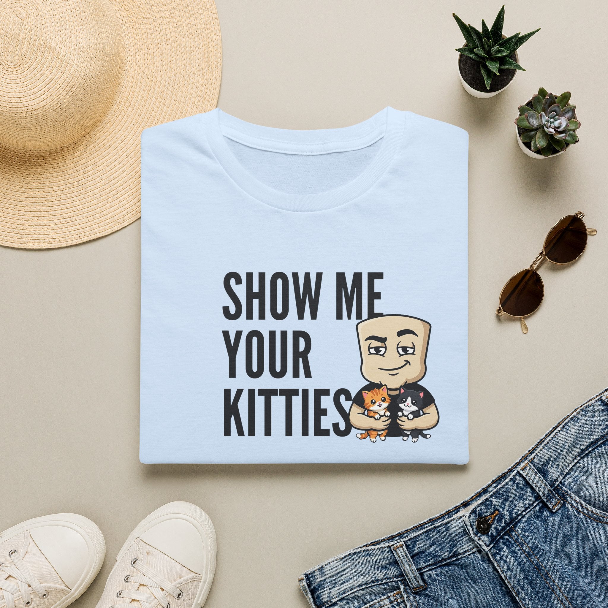 Light blue graphic t-shirt with text 'SHOW ME YOUR KITTIES' and cat illustration