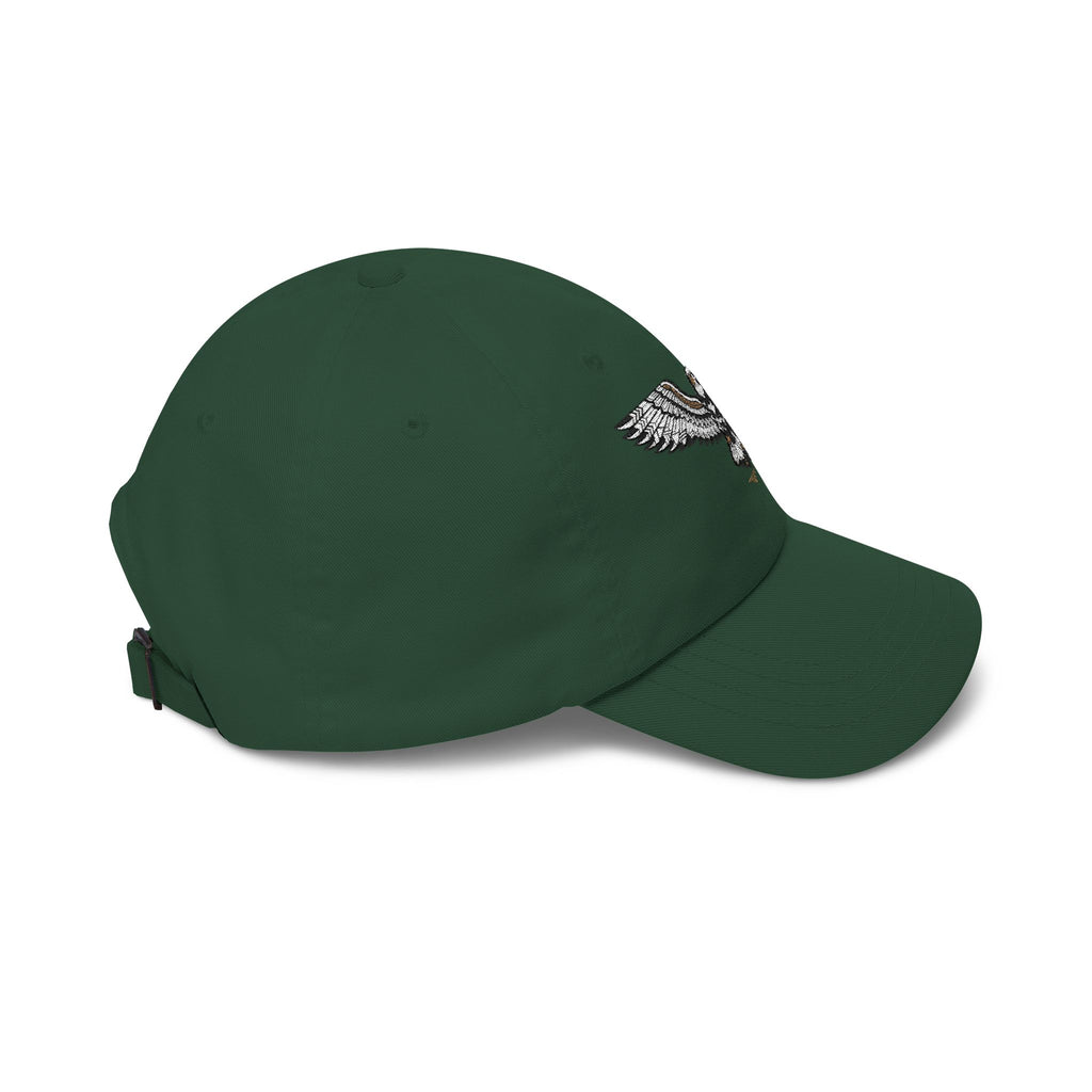 Dark green baseball cap angled view with embroidered eagle patch on side