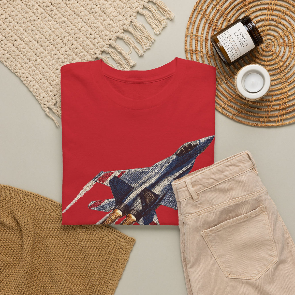 Red crew-neck T-shirt with colorful fighter jet graphic on lower front