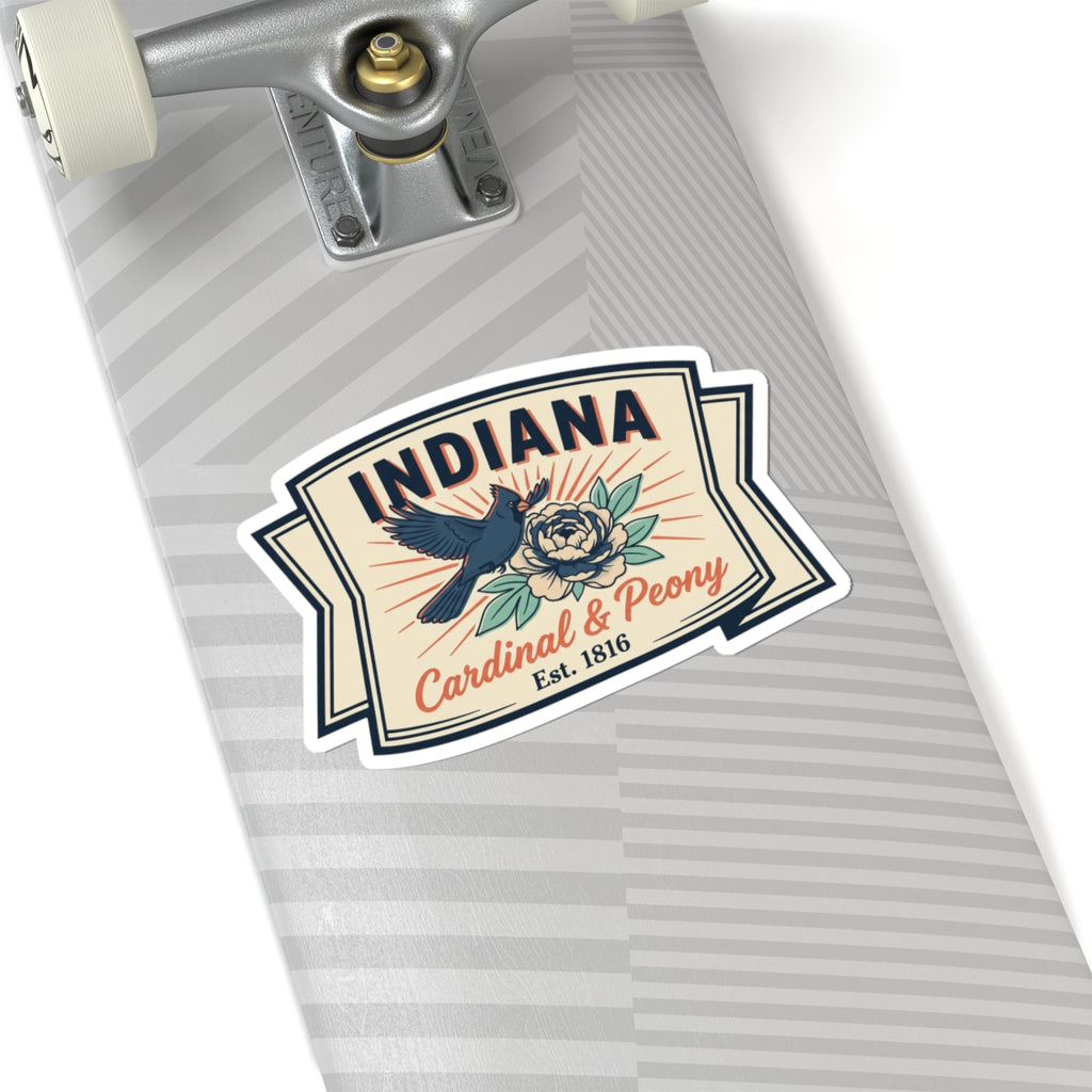 Indiana badge vinyl sticker on a striped folder showing cardinal, peony, and Est. 1816.