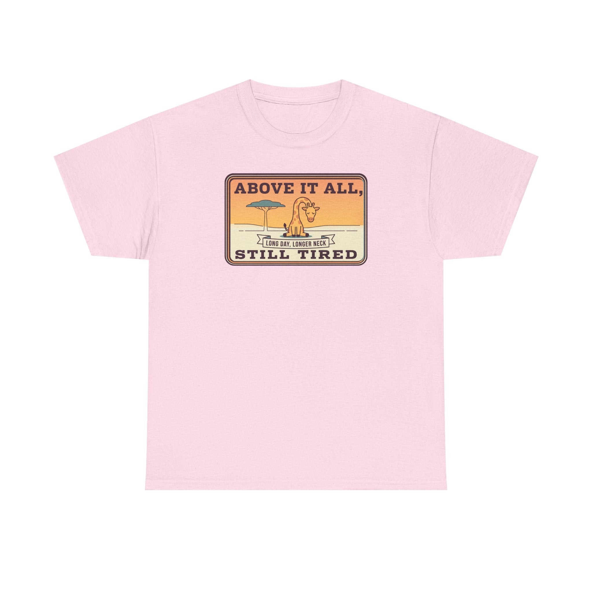 Pink graphic T-shirt with "ABOVE IT ALL, STILL TIRED" badge on chest.
