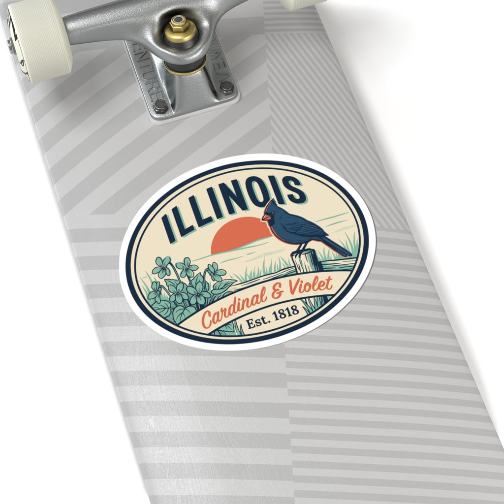 Oval vinyl sticker decal on striped surface with Illinois cardinal and Cardinal & Violet