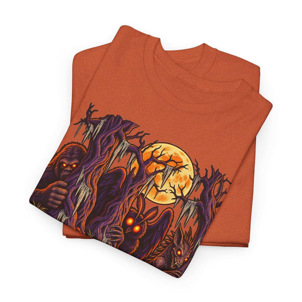 Burnt orange Halloween monster graphic T-shirt with glowing pumpkin skull print