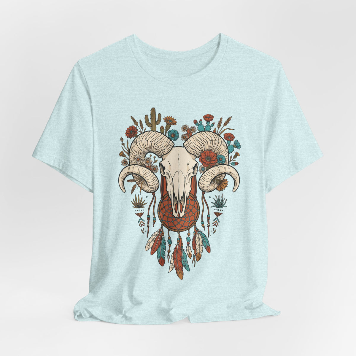 Light aqua t-shirt featuring ram skull horns with floral and cactus-style details