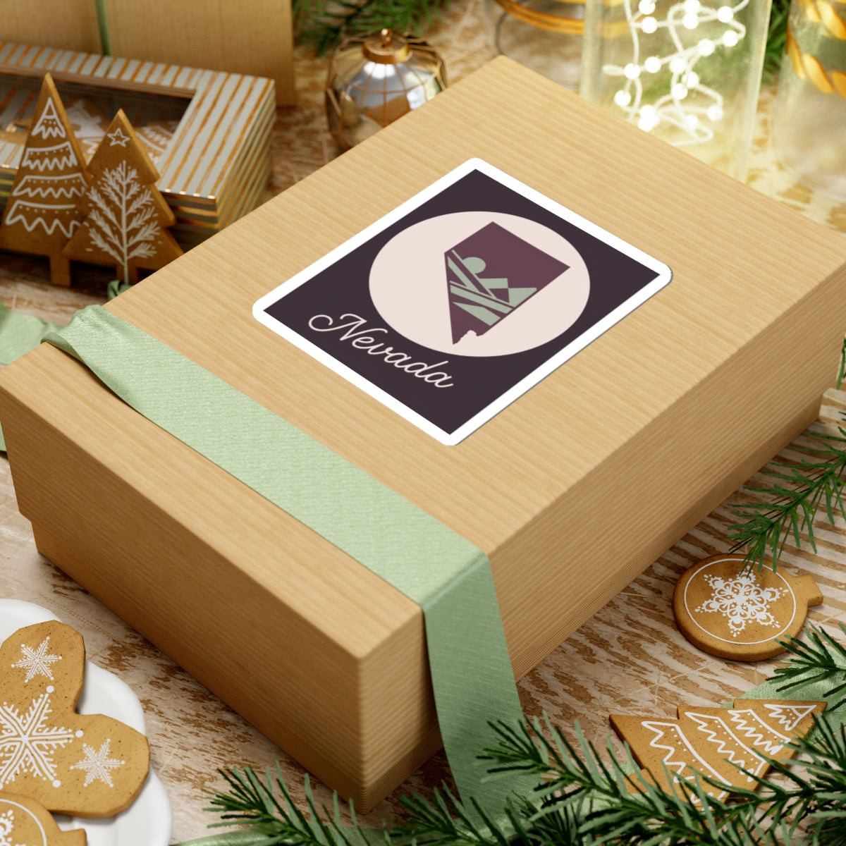 Nevada state gift sticker: square border, white circle, purple silhouette and script 'Nevada'