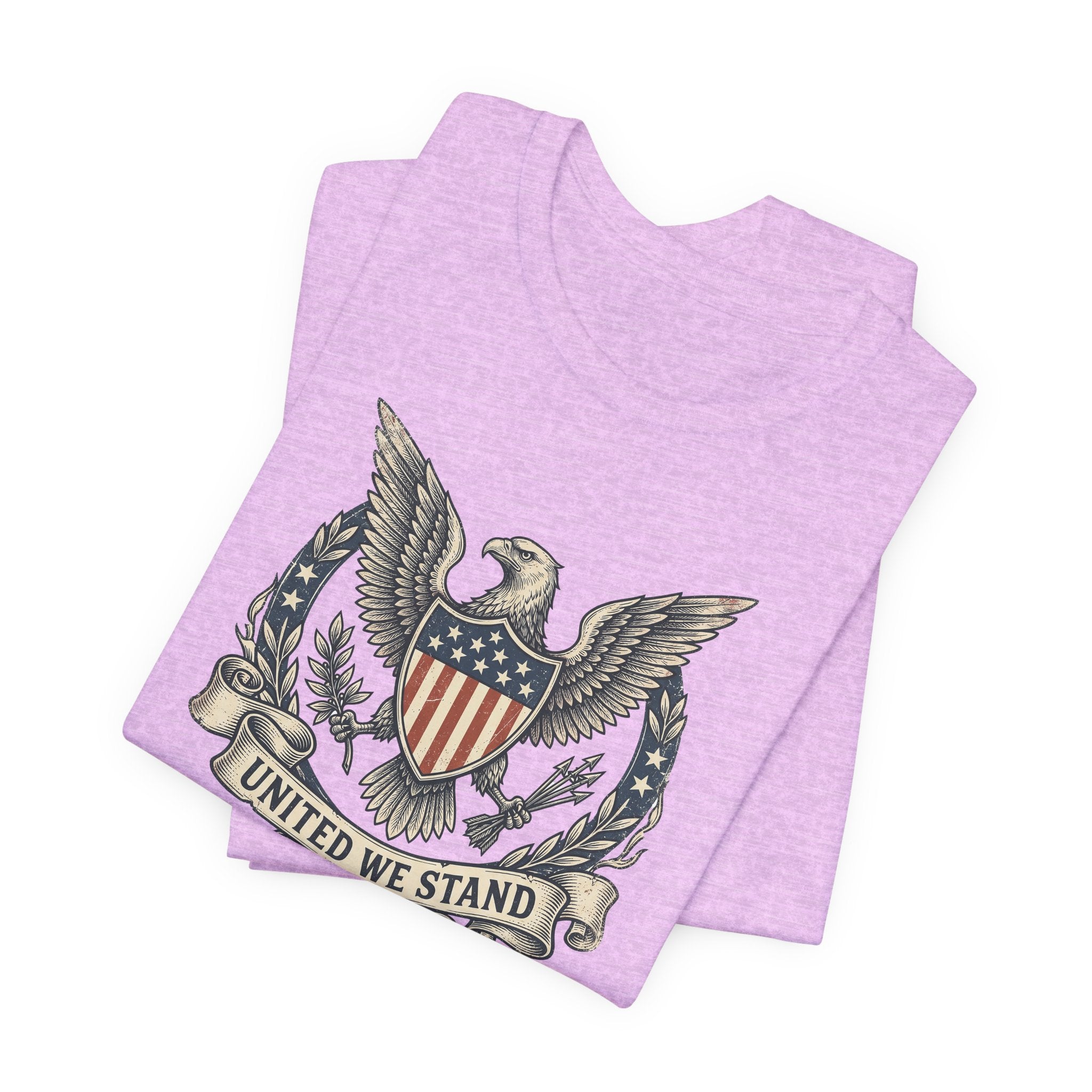 Lavender graphic T-shirt with eagle crest and “United We Stand” text