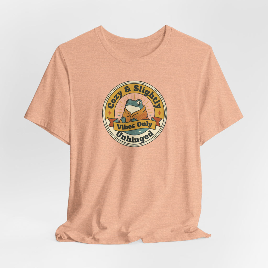 Heather peach T-shirt with centered round retro sloth logo graphic