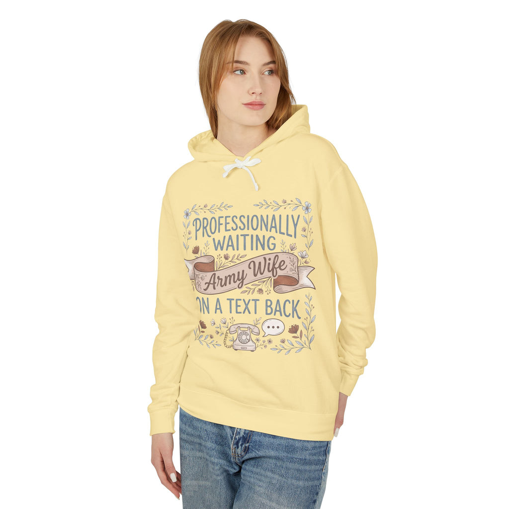 Light yellow hoodie with front graphic, drawstring hood and kangaroo pocket