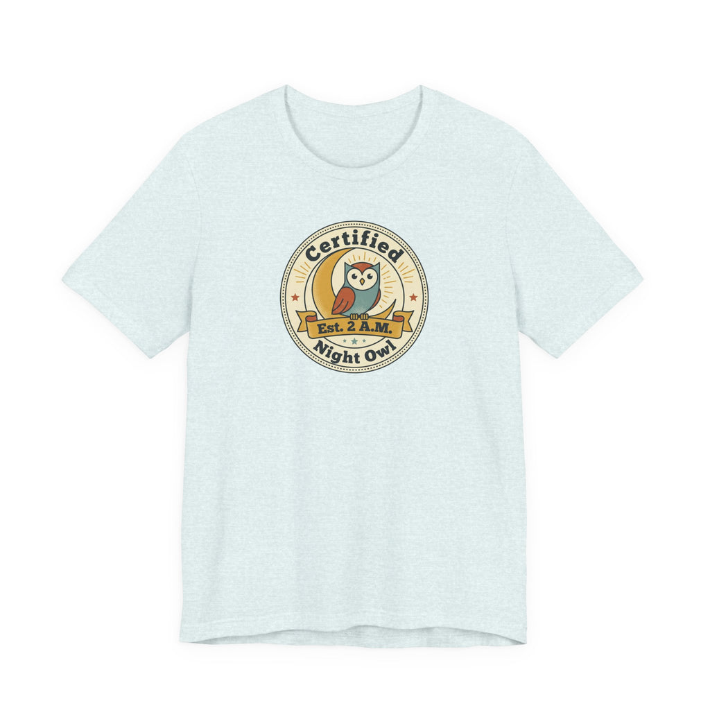 Light blue T-shirt with certified night owl badge graphic on chest