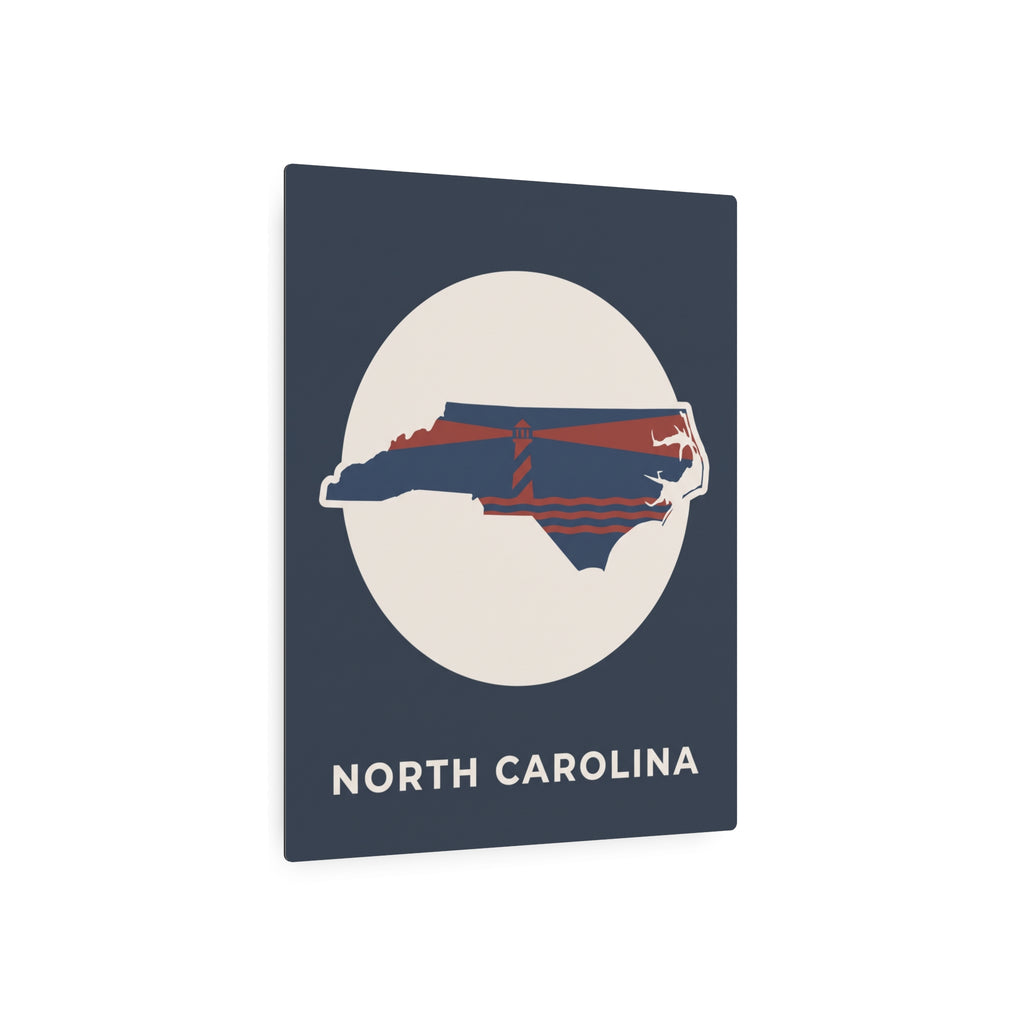North Carolina metal art sign with circular emblem, state outline, and lighthouse graphic