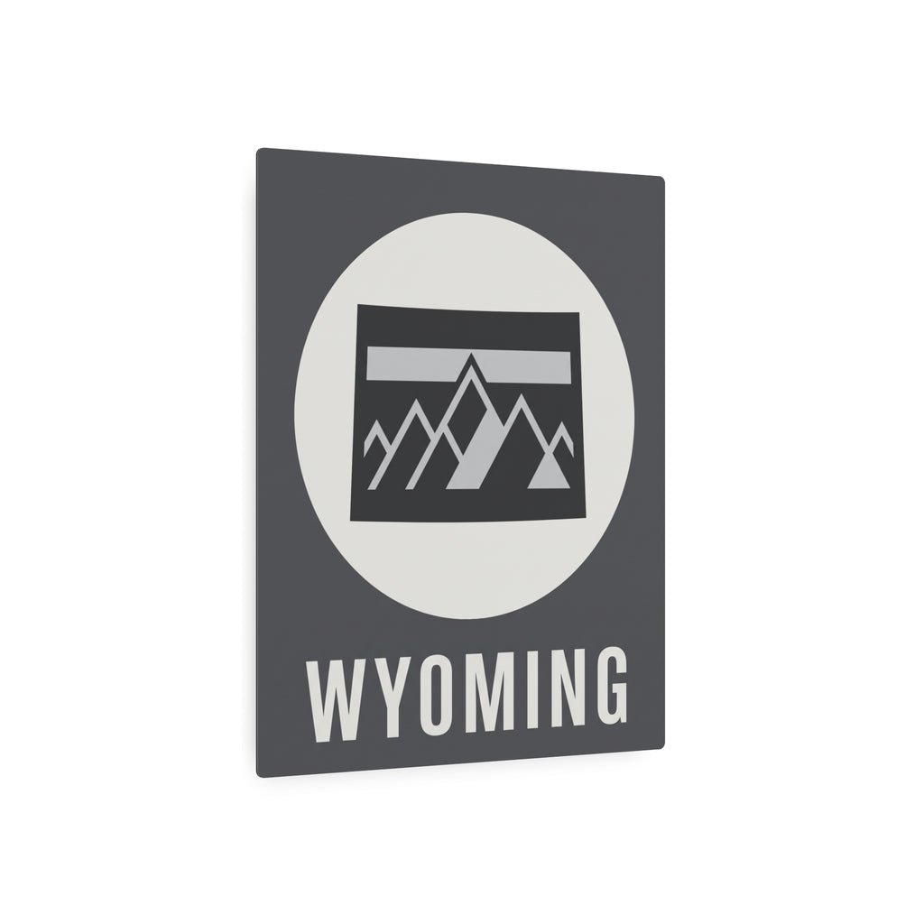 Wyoming metal wall sign square with dark gray face, white circle, mountain badge, and WYOMING text