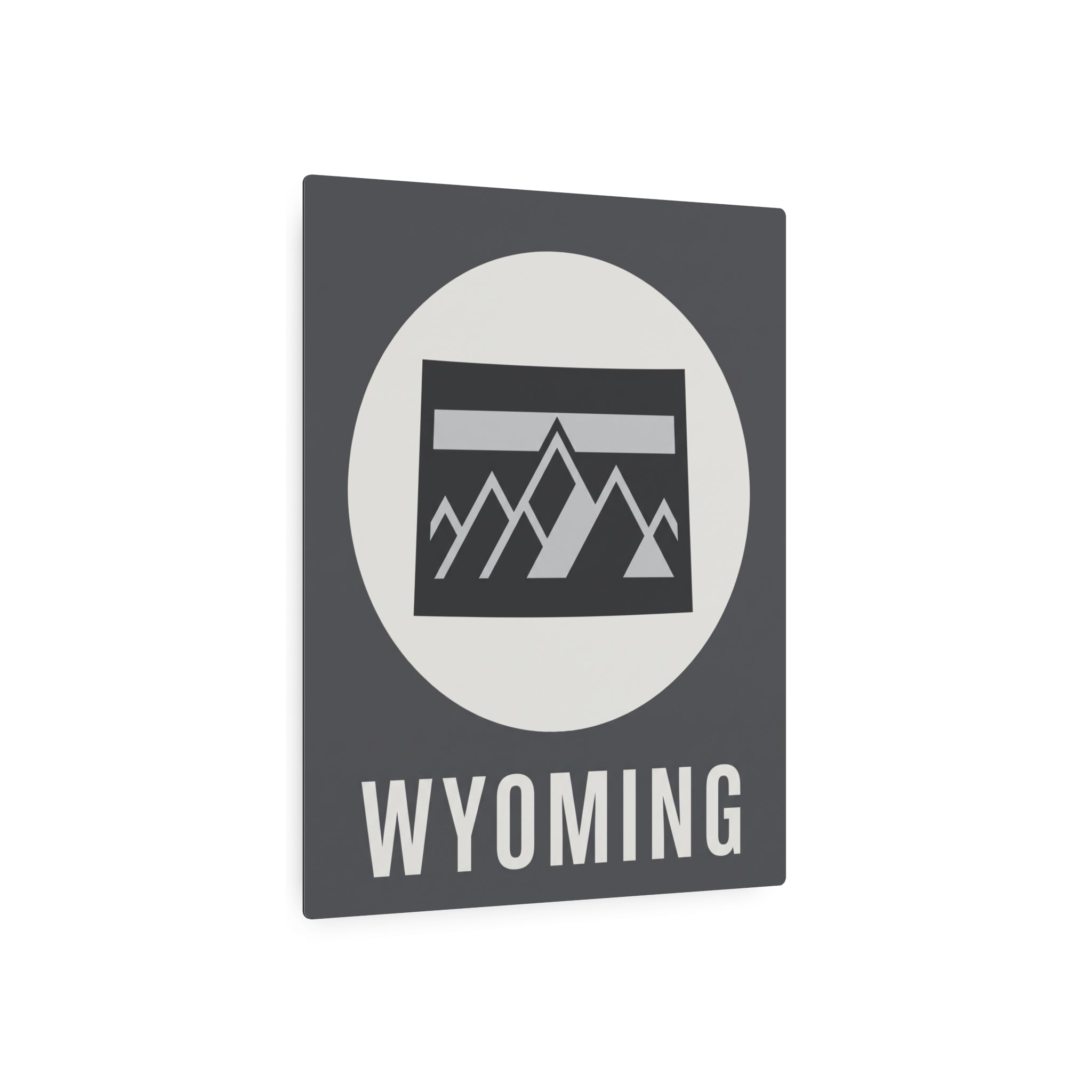 Wyoming metal wall sign square with dark gray face, white circle, mountain badge, and WYOMING text