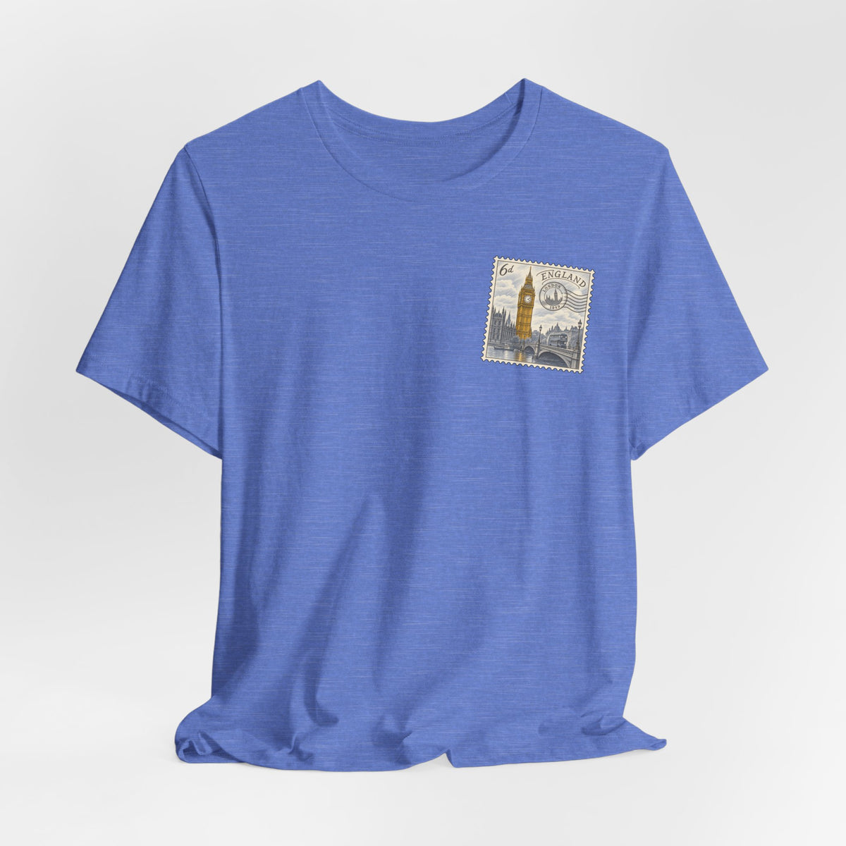 Blue short-sleeve T-shirt with small vintage postage stamp graphic on chest