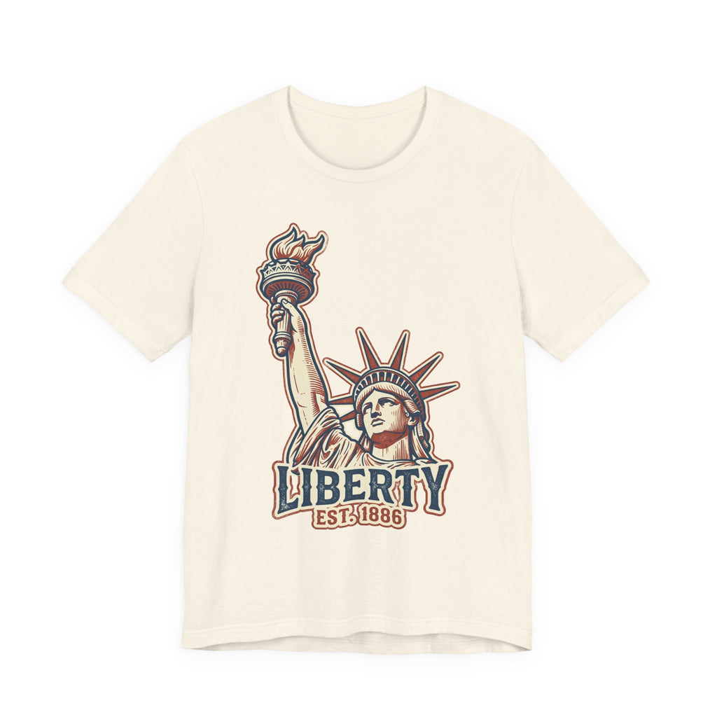 Natural/off-white crewneck graphic T-shirt with Statue of Liberty and “LIBERTY EST. 1886”