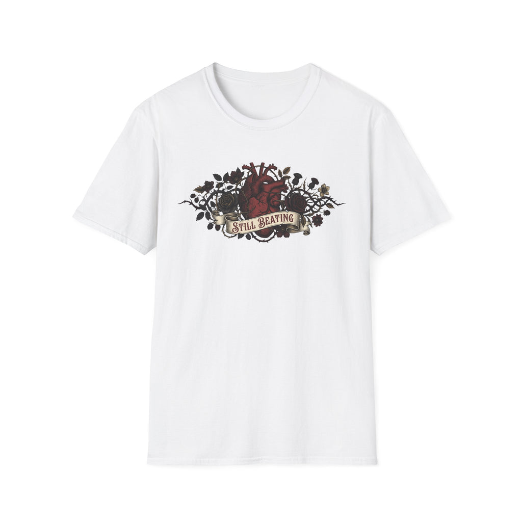 White T-shirt featuring a gothic floral anatomical heart graphic with “Still Beating”