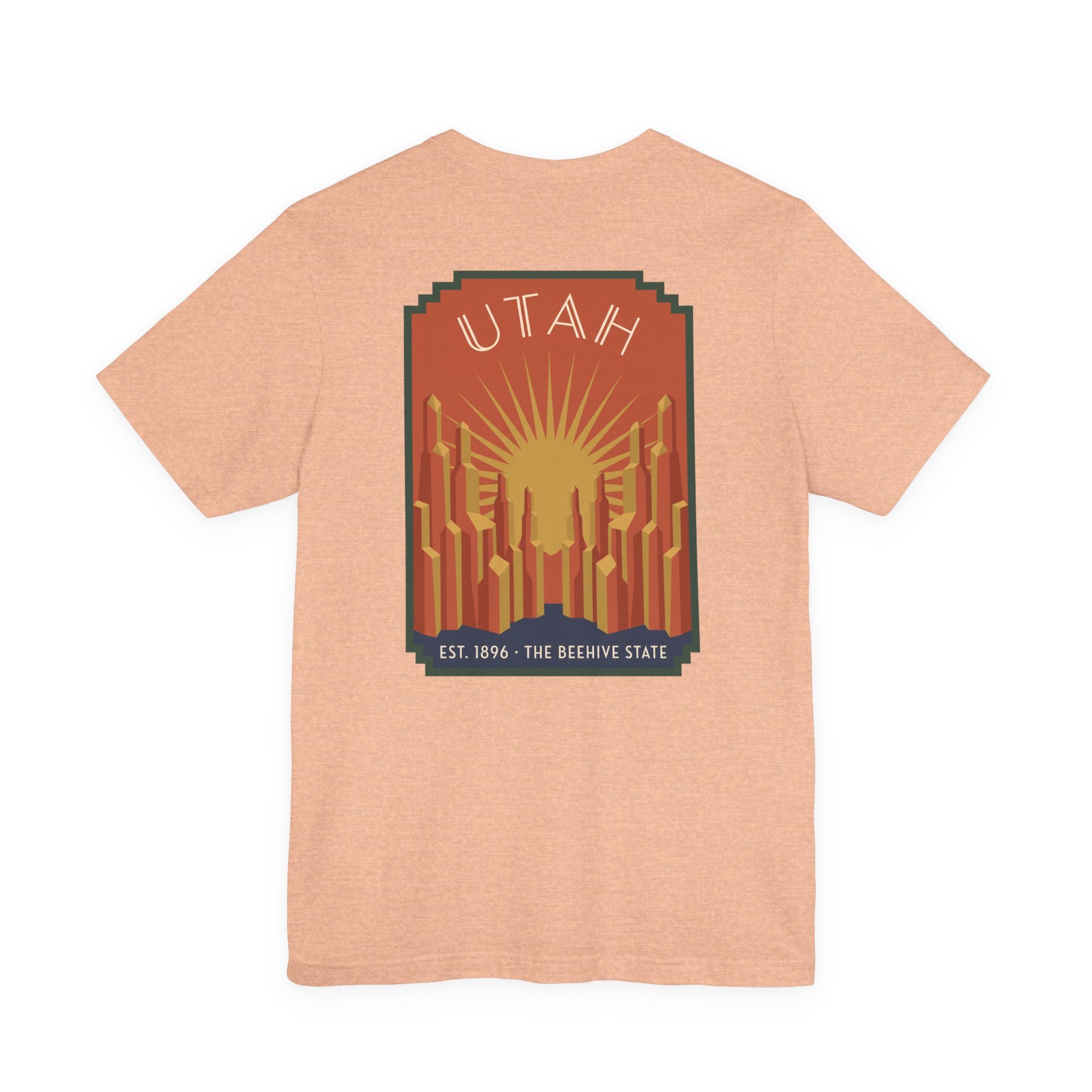 Light peach T-shirt with Utah sunrise art deco square graphic, UTAH text and skyline
