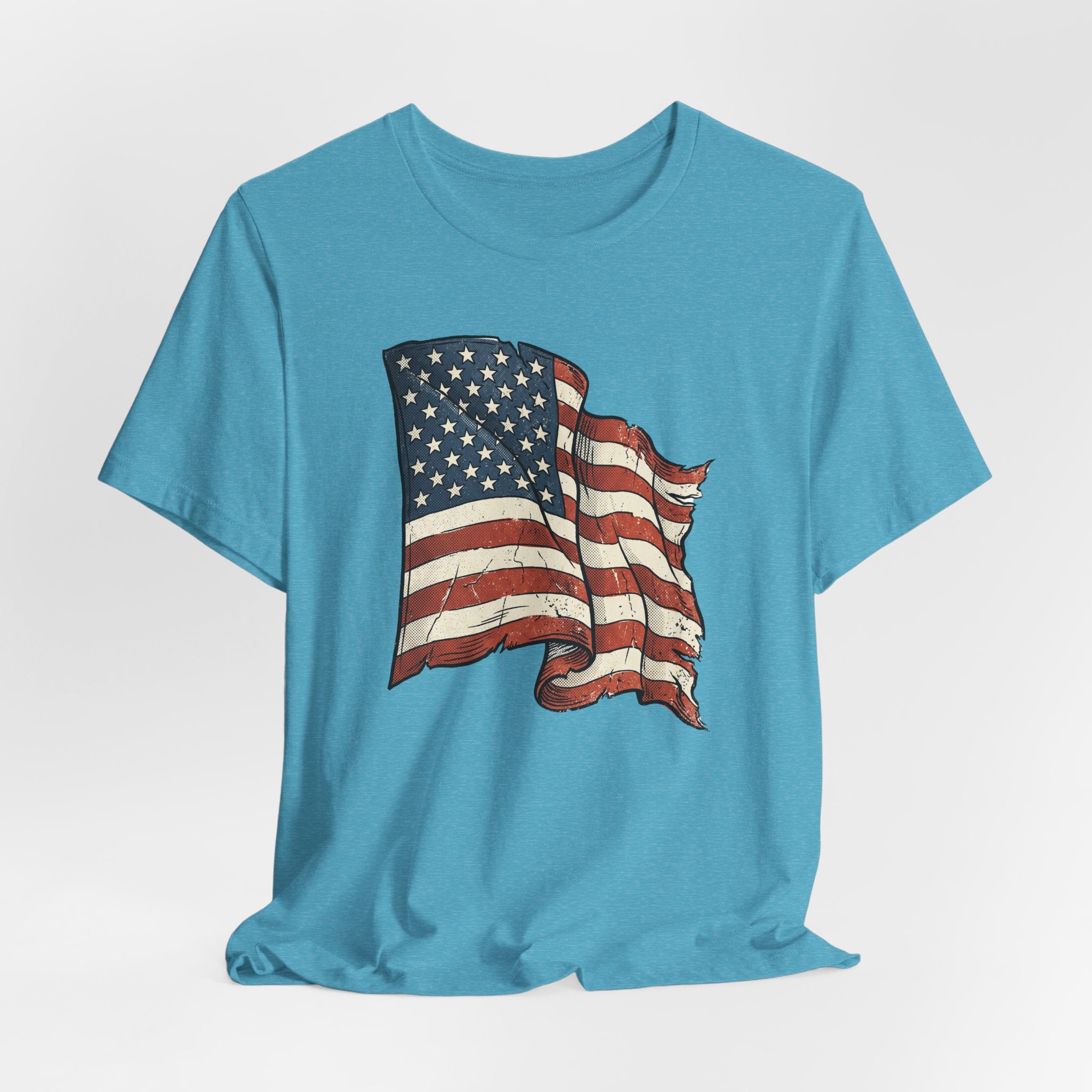 Light aqua short-sleeve T-shirt with waving American flag graphic