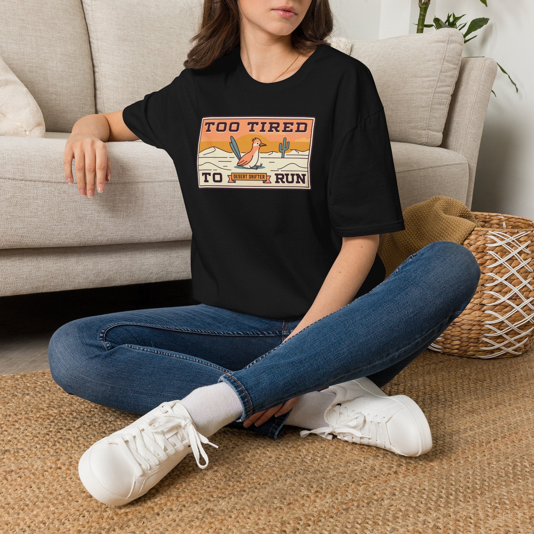 Black crew-neck T-shirt with desert road runner graphic on chest