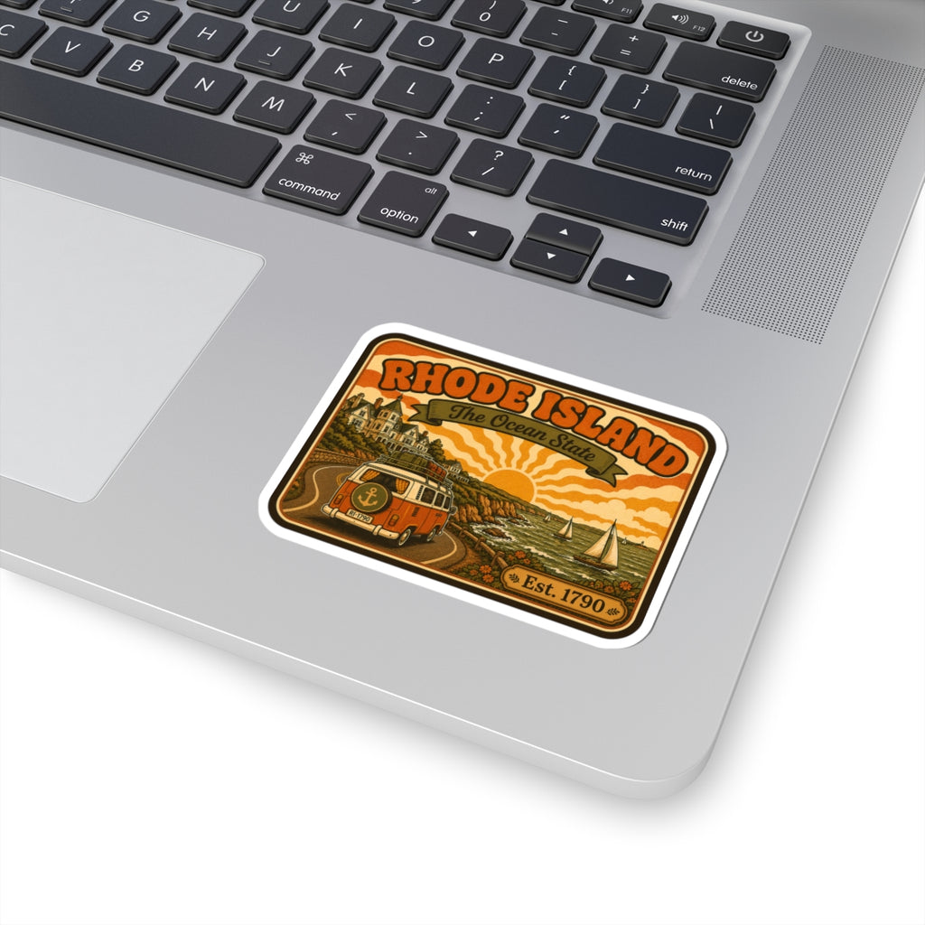 Rhode Island sticker on laptop keyboard, orange camper van and Est. 1790