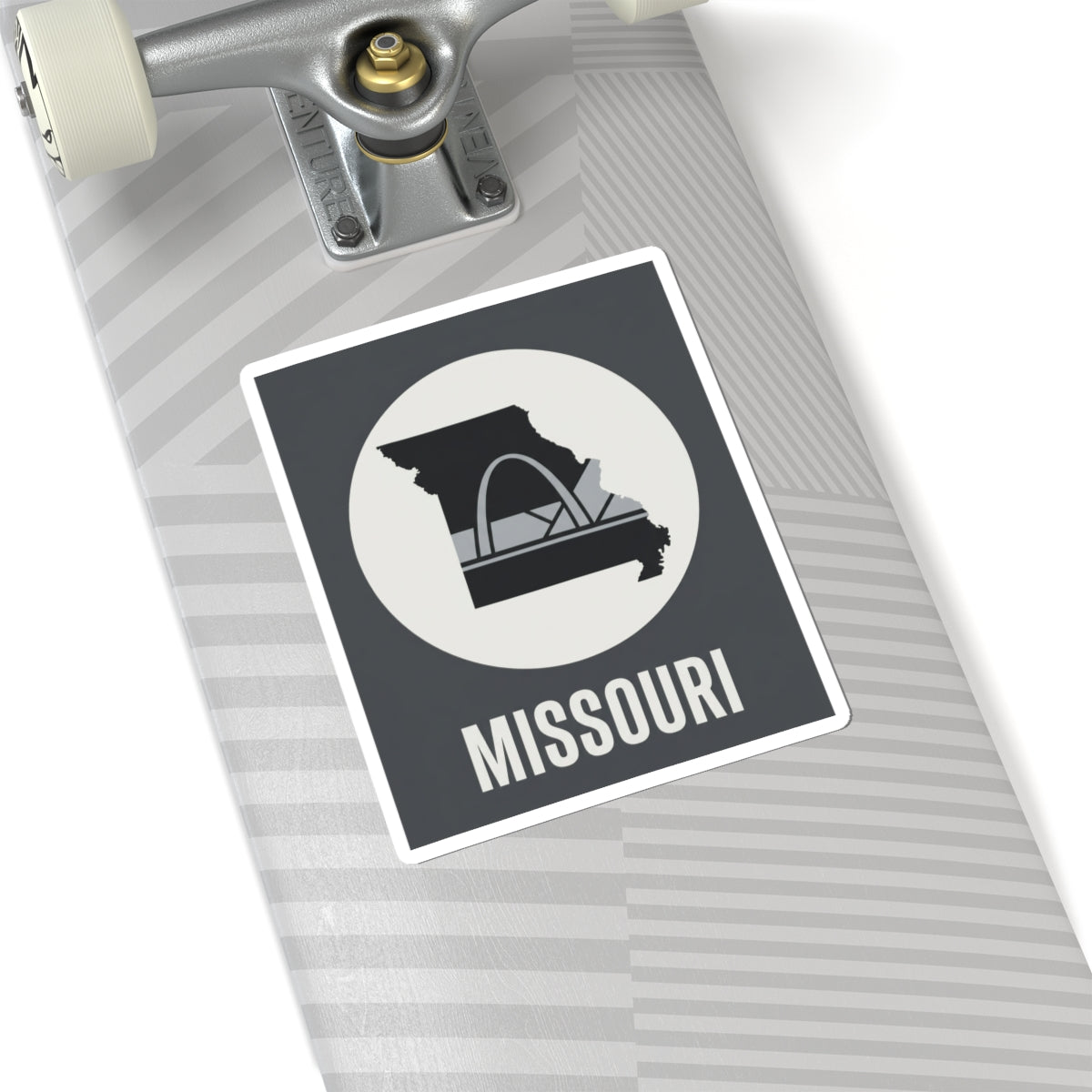 Missouri sticker with Gateway Arch icon and “MISSOURI” text on a gray surface