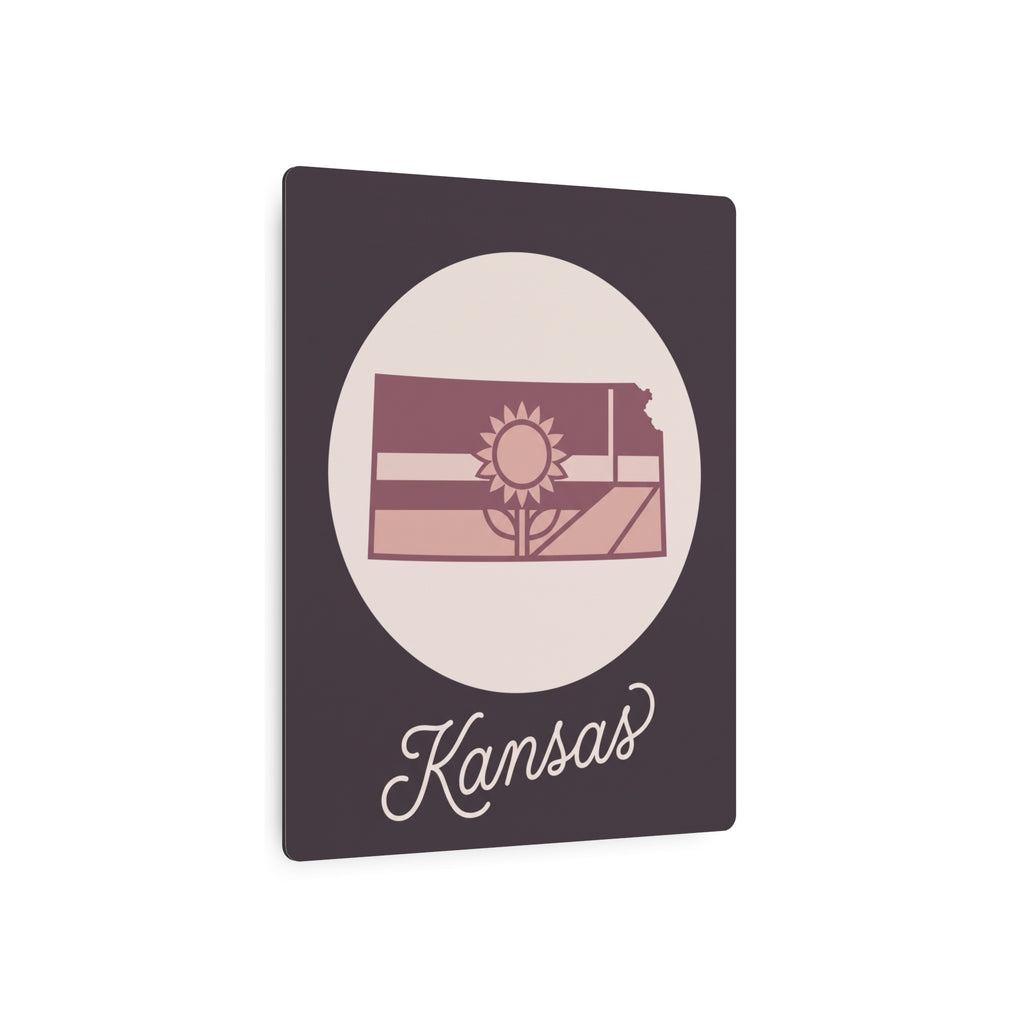 Kansas metal wall art sign with dark square background, oval sun field design, and Kansas script.