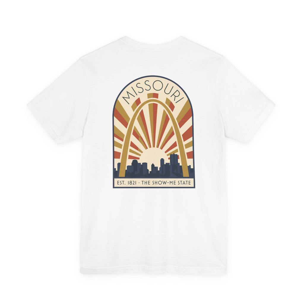 White Missouri sunrise art deco T-shirt with arch skyline graphic and “MISSOURI” text.