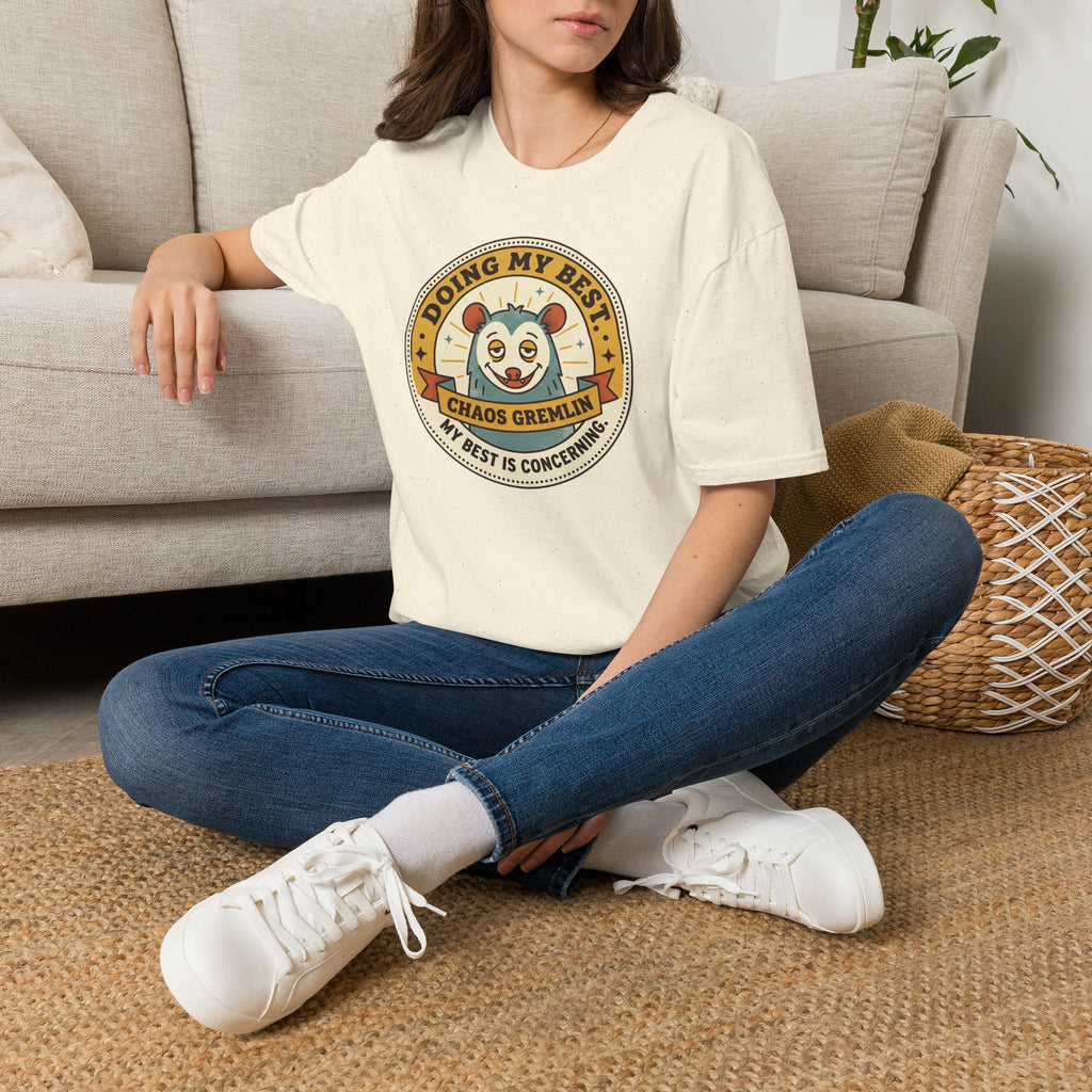Cream Chaos Gremlin graphic T-shirt with circular mascot logo on chest