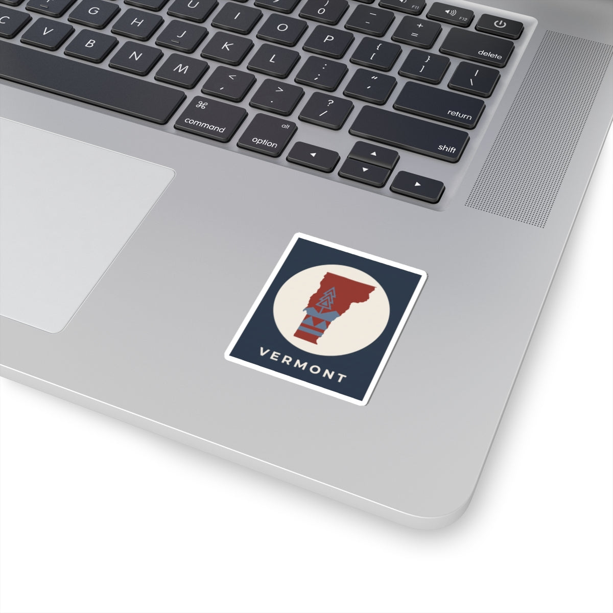 Square Vermont state map sticker with retro mountain red/blue design and “VERMONT” text