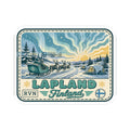 Rectangular sticker with Lapland Finland text, reindeer sleigh, northern lights, and cabin