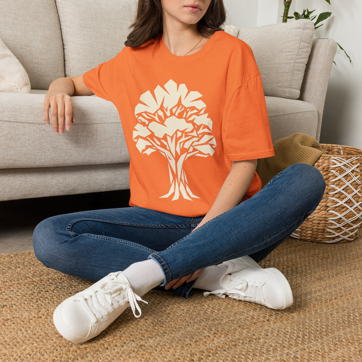 Orange t-shirt with geometric tree graphic, crew neck short sleeves