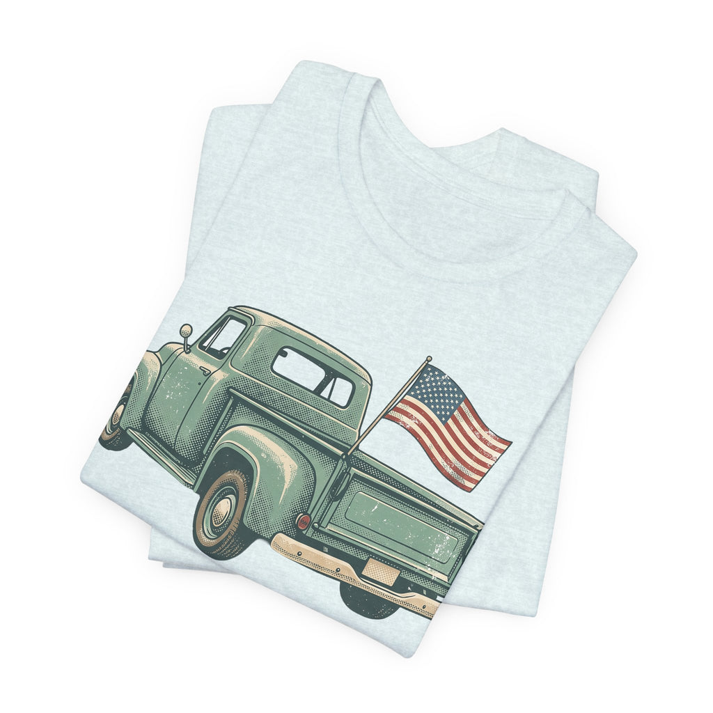 Light blue t-shirt with green pickup truck and American flag graphic