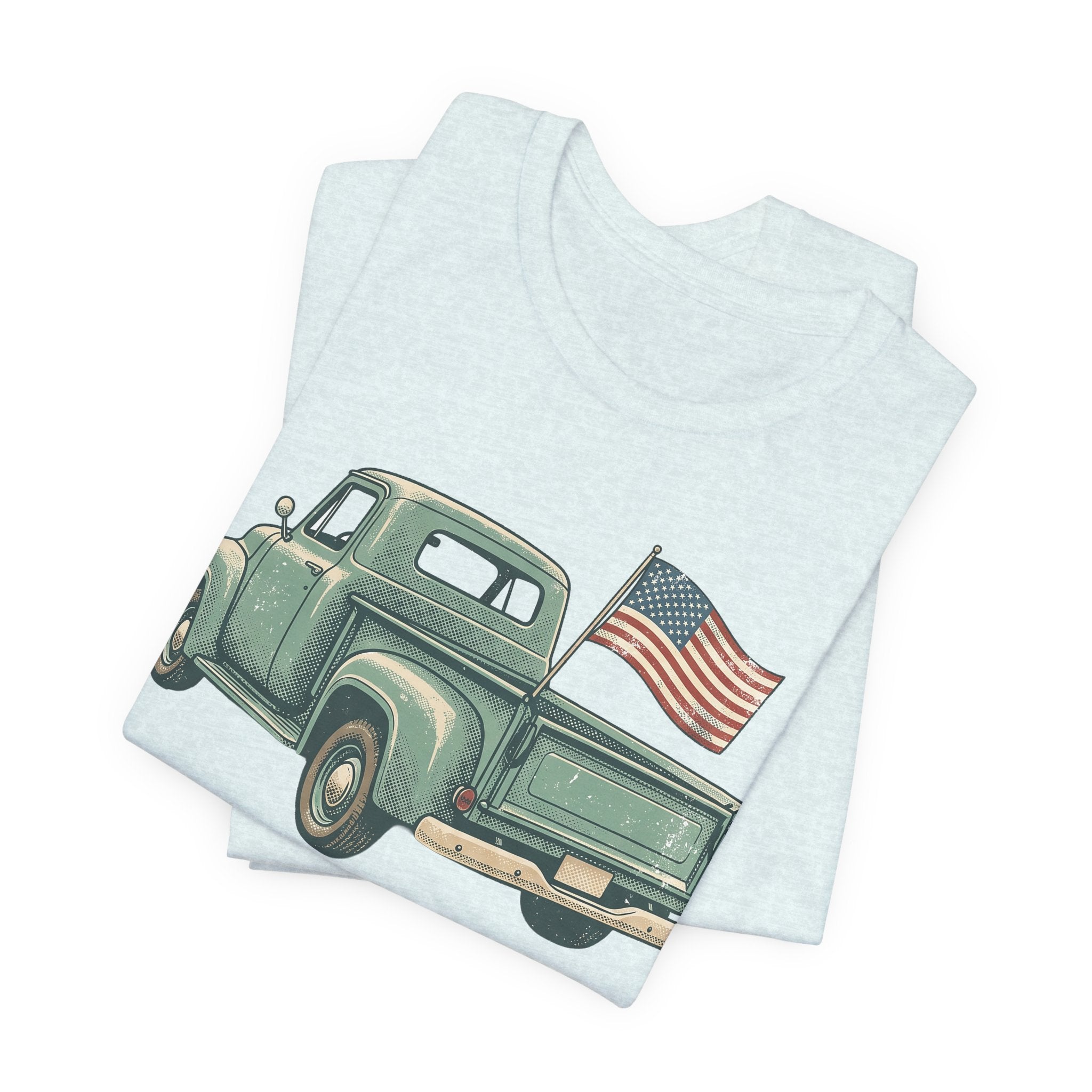 Light blue t-shirt with green pickup truck and American flag graphic