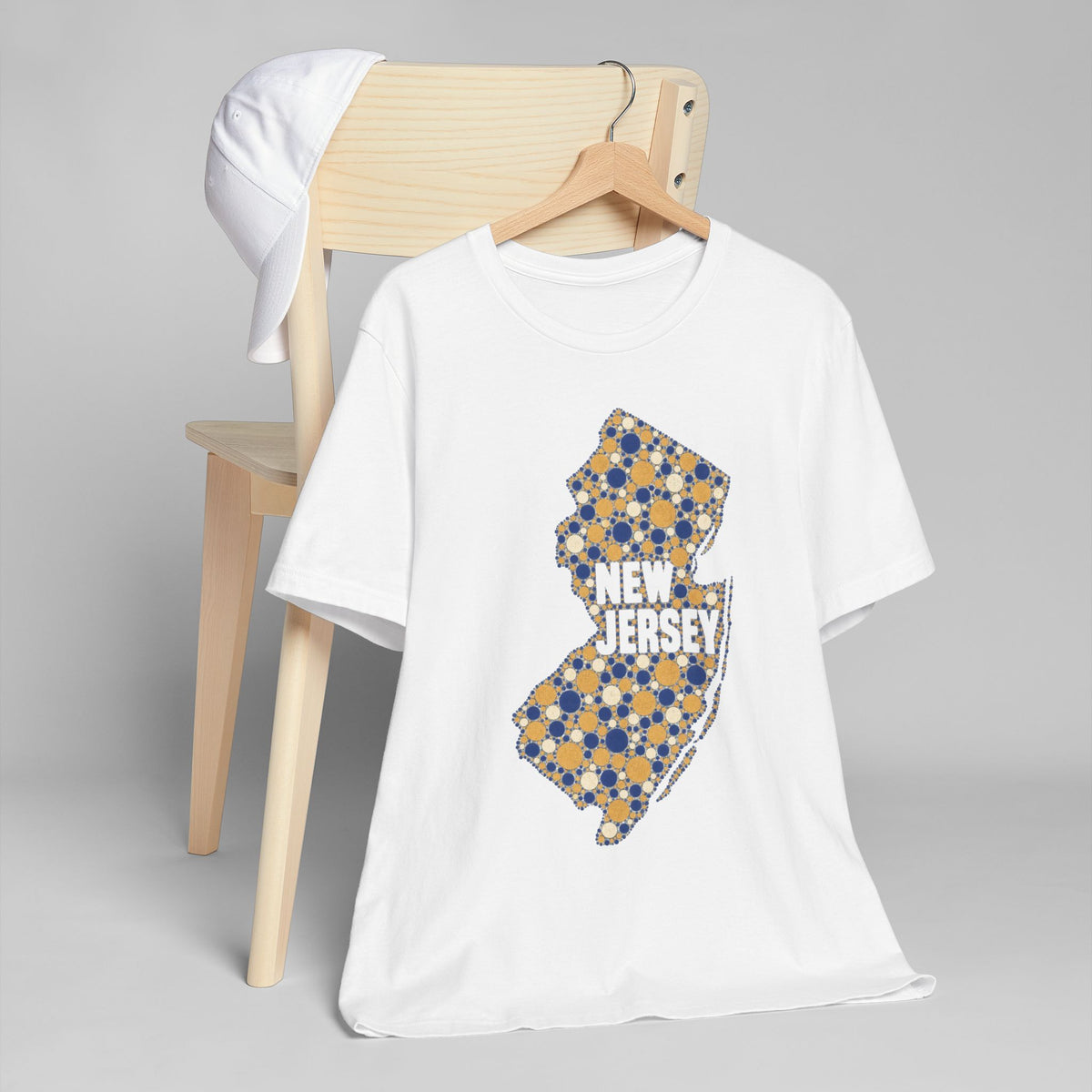 White t-shirt with colorful floral New Jersey outline graphic on the front