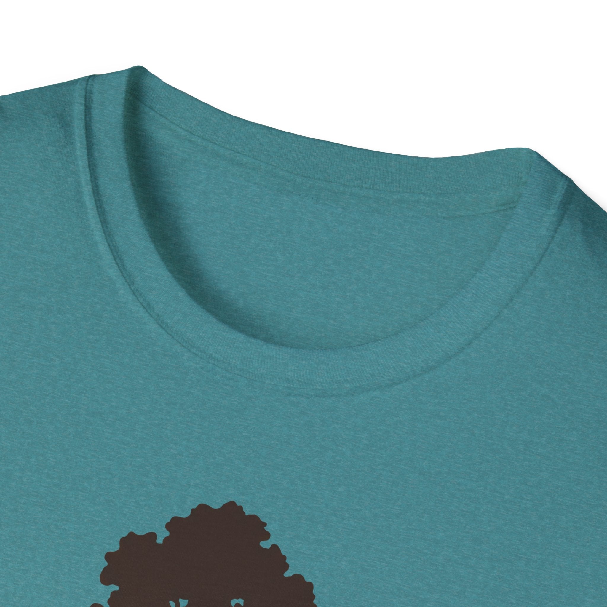 Teal T-shirt close-up of crew neck; partial sequoia tree graphic near bottom
