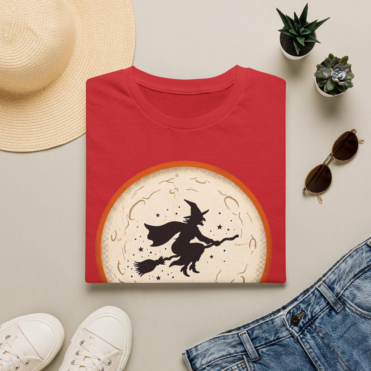 Witch silhouette T-shirt in red with flying witch in moon graphic