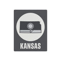 Dark gray metal Kansas wall sign with sunburst, Kansas outline, and white 'KANSAS' text