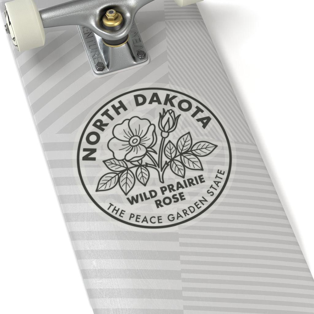 Circular wild prairie rose sticker with botanical leaves and North Dakota text