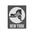 Dark gray square metal art sign with New York skyline inside a circle and “NEW YORK” text