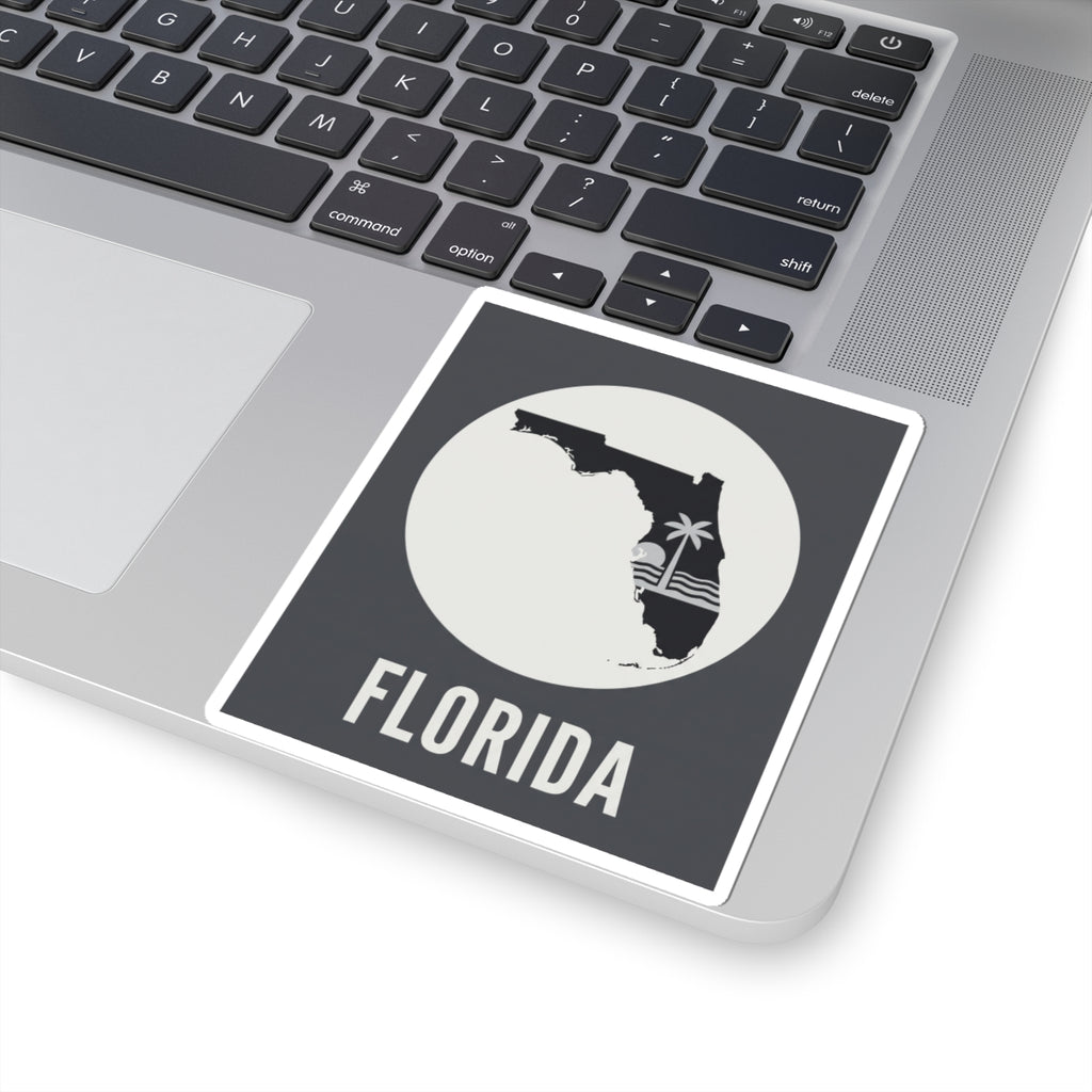Florida silhouette kiss-cut sticker on laptop, circular palm wave design and FLORIDA lettering