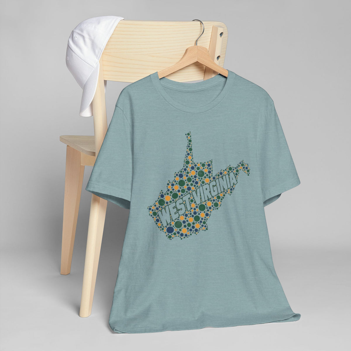 Light teal crewneck T-shirt with colorful West Virginia floral map graphic