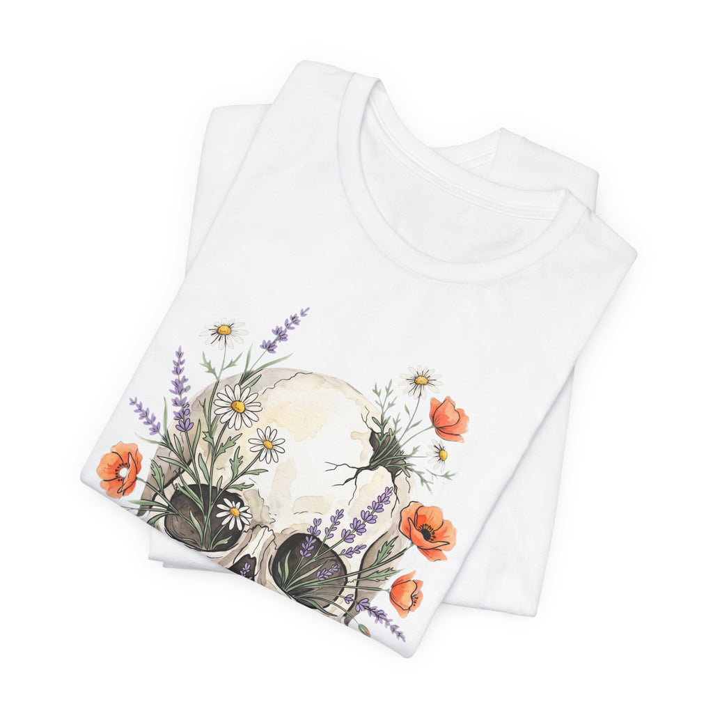 White floral skull T-shirt front graphic with poppies and wildflowers on folded tee