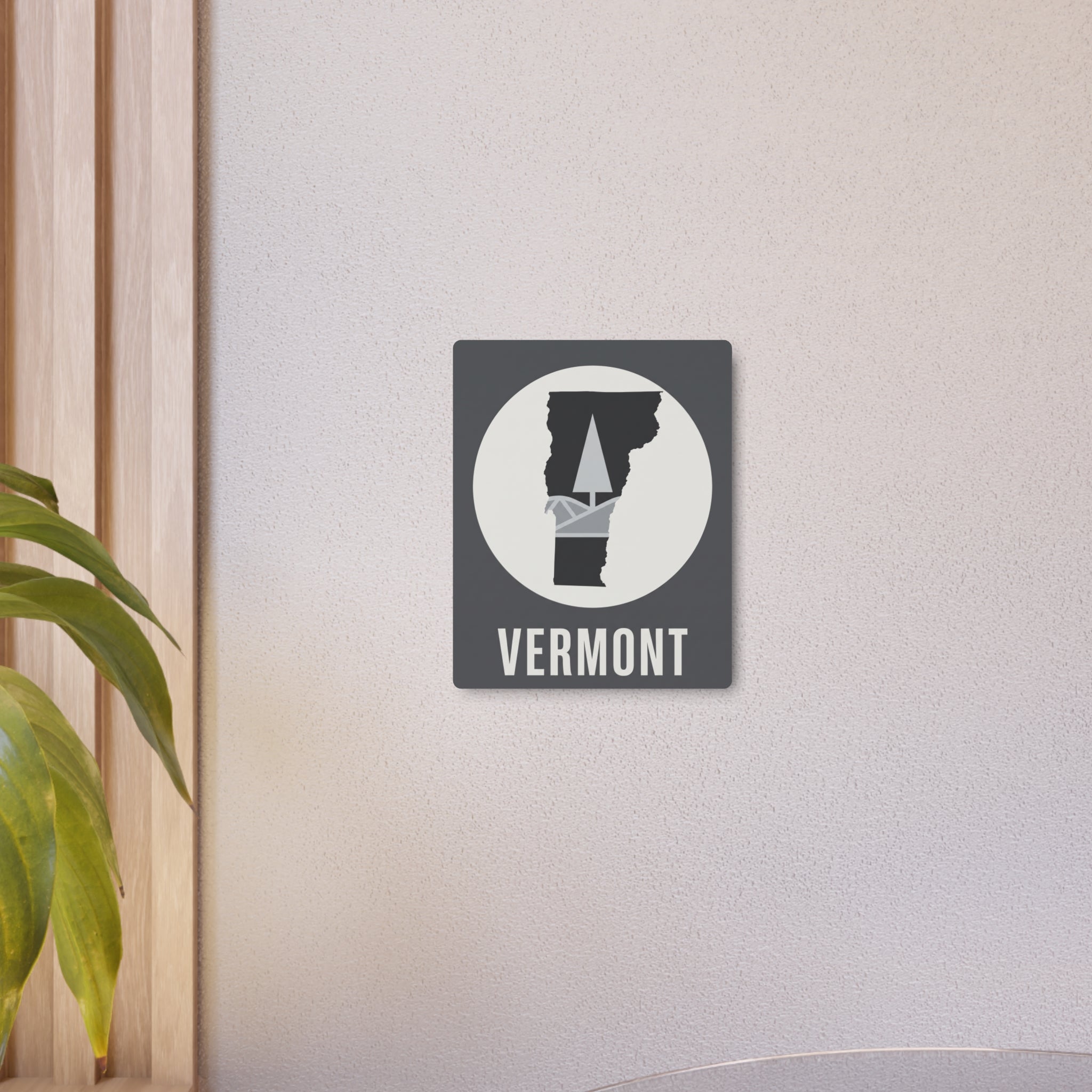 Small square Vermont metal wall art with pine-tree state graphic and “VERMONT” word.
